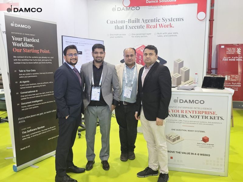 Four members of the Damco team at their booth