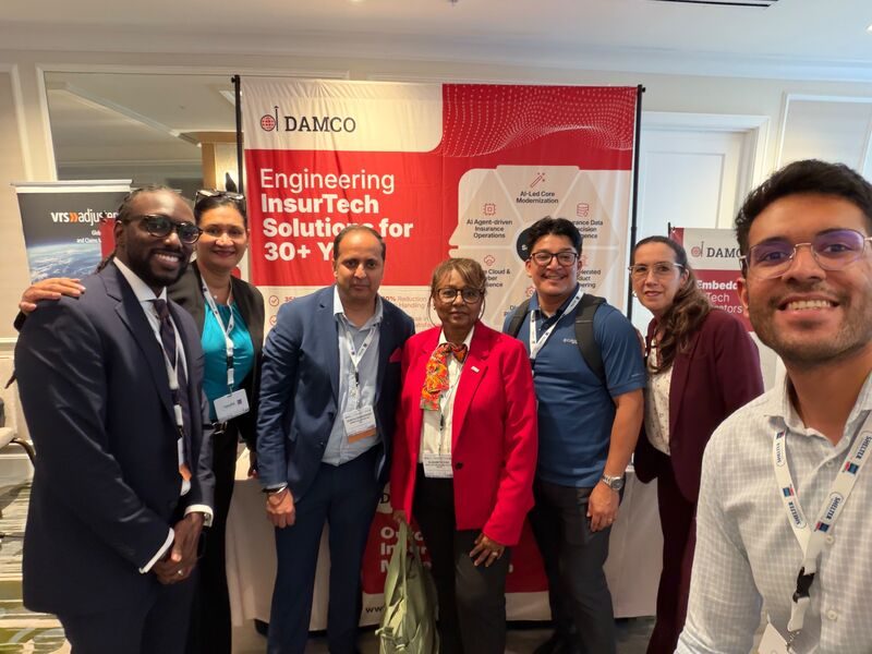Damco's insurance team with insurers at a conference