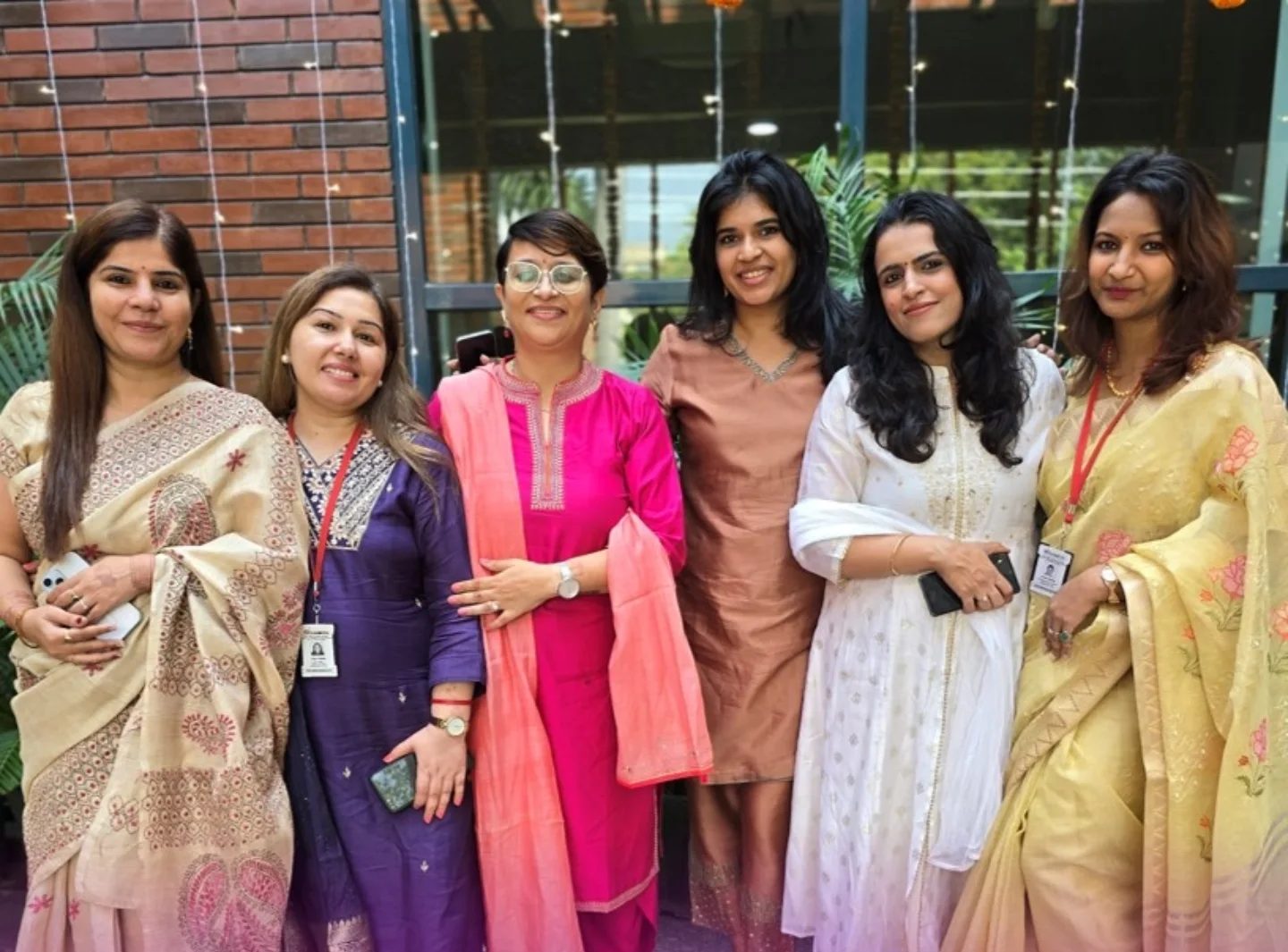 Colleagues in sarees and kurtas at Damco's Diwali celebration