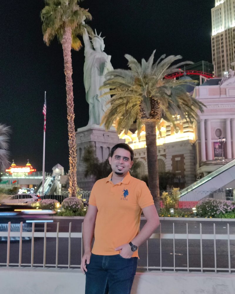 Yogesh Ralhan on a street at night