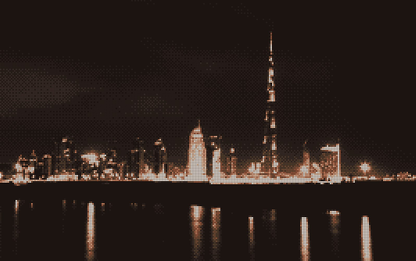 The Dubai skyline at night, etched in bronze